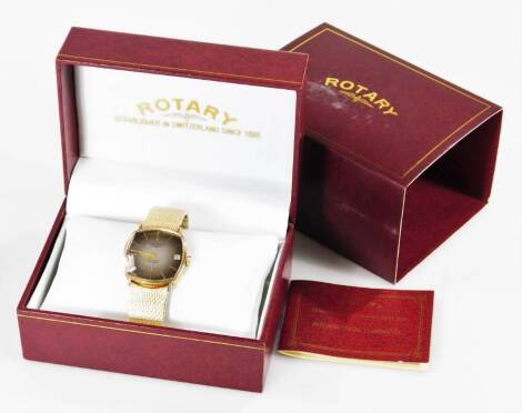 A Rotary gentleman's 9ct gold cased wristwatch, c1996, brown dial bearing batons, subsidiary seconds dial and date aperture, model no 2493128, on a plated strap, boxed with certificate, 44.9g all in.