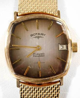 A Rotary gentleman's 9ct gold cased wristwatch, c1996, brown dial bearing batons, subsidiary seconds dial and date aperture, model no 2493128, on a plated strap, boxed with certificate, 44.9g all in. - 2