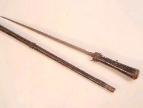 An antique leather bound sword stick