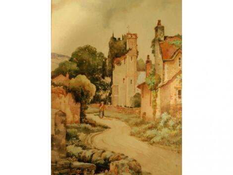 Two unframed watercolours depicting churches in landscape