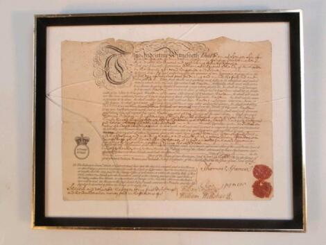 A framed 19thC indenture