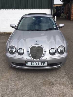 A Jaguar S-Type V8 R Auto, J20 LTP, four door saloon, petrol, 4196cc, silver, circa 174,155 recorded miles, V5 manual and part service history present, taxed until 01/01/2020, MOT expired on 04/07/2019. Provenance: https://www.goldingyoung.com/about/news - 2