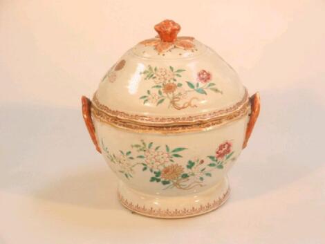 An 18th Century Chinese famille rose tureen and cover with moulded handles