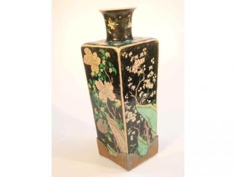 A Chinese Famille Noire vase