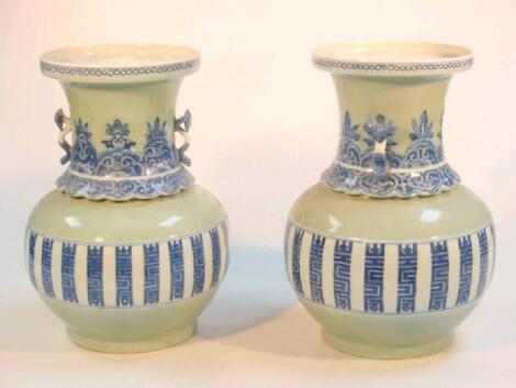 A pair of Chinese Celadon and blue and white porcelain vases