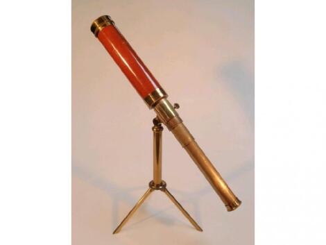 A mahogany cased brass table top telescope