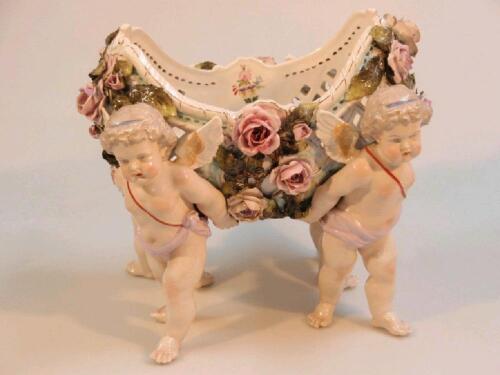 An early 20thC German porcelain table centrepiece