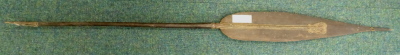 A Papua New Guinea tribal paddle, with carved blade, tapering handle and shaped finial, bearing label stating Aborigine boat paddles, brought to England 1910, 182cm L. - 3