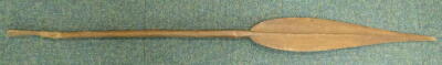 A Papua New Guinea tribal paddle, with leaf shaped blade, tapering handle with carved finial, bearing label stating Aborigine boat paddles, brought to England 1910, 153cm L. - 3