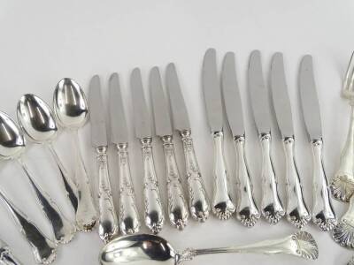 A Norwegian silver part canteen of cutlery, each piece decorated with shells, acanthus etc, stamped 930S some pieces stamped Tostrup, possibly for Jacob Tostrup 1806-1890, 30oz, and a set of six Norwegian silver dessert spoons 6¾oz, and various other kniv - 3