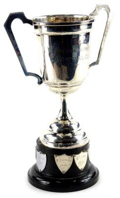 A silver two handled trophy, the Bracebridge Heath Hospital cup on domed base, with black plastic plinth engraved with various names, 4¾oz, 23cm H overall.