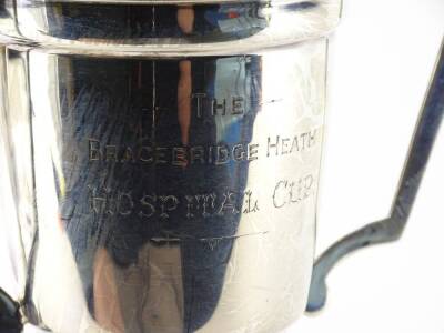 A silver two handled trophy, the Bracebridge Heath Hospital cup on domed base, with black plastic plinth engraved with various names, 4¾oz, 23cm H overall. - 3