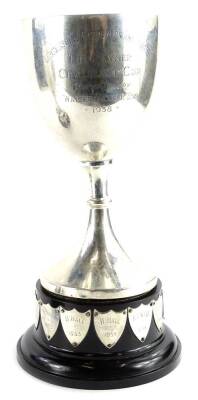 A George V silver goblet shaped trophy, engraved Lincolnshire Gardeners Association, The Rayner Challenge Cup, presented by Walter Rayner Esquire 1938, Birmingham 1932, 14¾oz, 26cm H, and a black Bakelite plinth engraved with various names.