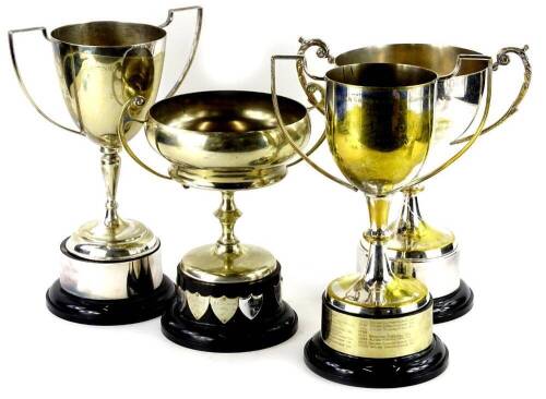 Four silver plated two handled trophies, each relating to Lincoln Gardening Society, and with ebonised black plastic plinths, the largest 35cm H.