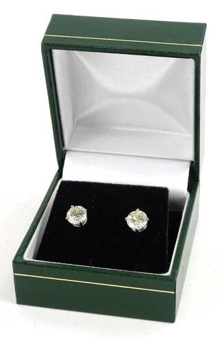 A pair of 18ct white gold diamond earrings, with round brilliant cut diamonds, each in claw setting, approx 1.08cts, each, with butterfly backs, 2g all in.