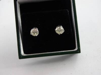 A pair of 18ct white gold diamond earrings, with round brilliant cut diamonds, each in claw setting, approx 1.08cts, each, with butterfly backs, 2g all in. - 2