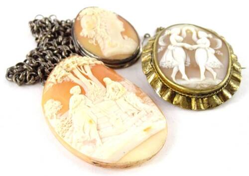 Various cameos and cameo brooches, comprising a large oval shell cameo brooch, unmounted, 5.5cm x 4cm, an oval shell cameo brooch in gilt metal ornate frame, 4.5cm x 5cm, and another in a silver frame, on silver chain. (3)