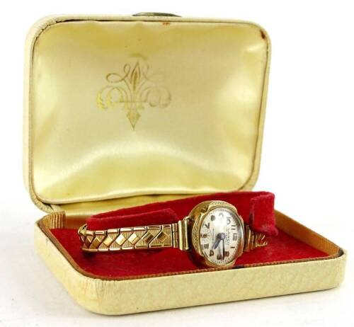 A Lanco ladies wristwatch, with small circular watch head, on expanding bracelet, gold plated.