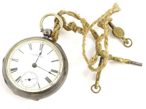 A Victorian Waltham & Co silver open faced pocket watch, with white enamel dial, with Roman numerals and seconds dial, with blue hands, engine turned shield stamped back, key wind, 122.3g all in.