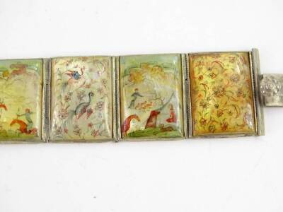 An Oriental style bracelet, with nine painted mother of pearl rectangular panels, depicting birds, flowers and figures, in white metal surround, unmarked, 19cm long overall. - 2