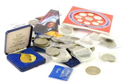 A quantity of commemorative crowns, coin sets, etc.