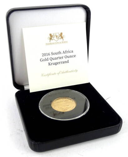 A 2016 quarter ounce gold krugerrand, boxed etc.