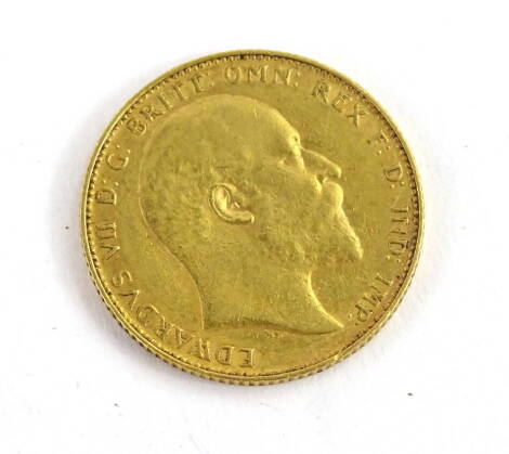 An Edward VII 1908 gold sovereign.