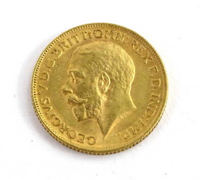 A George V 1912 gold sovereign.