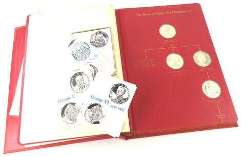 A set of forty three silver medallions, The Kings and Queens of England First edition. sterling silver proof set, with folder and information sheets.