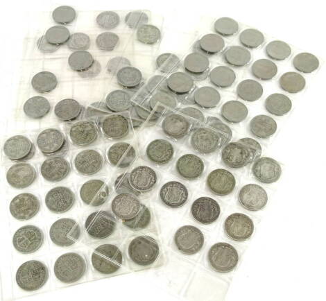 Various nickel silver and silver half crowns.