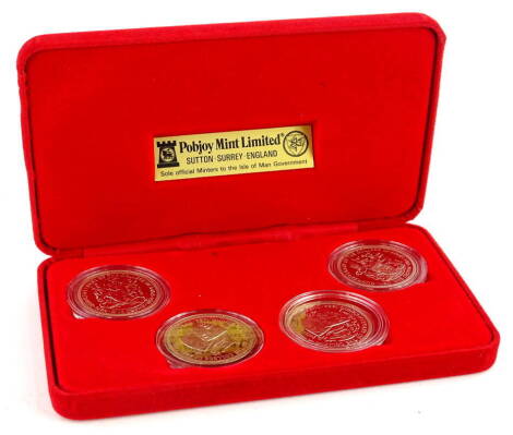 A cased set of Pobjoy Mint, a four coin set commemorating the Queens centenary of the college of Arms in original packaging.