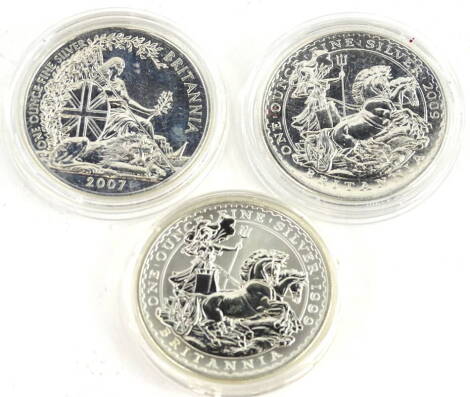 Three silver Britannia coins, comprising 1999, 2007 and 2009.