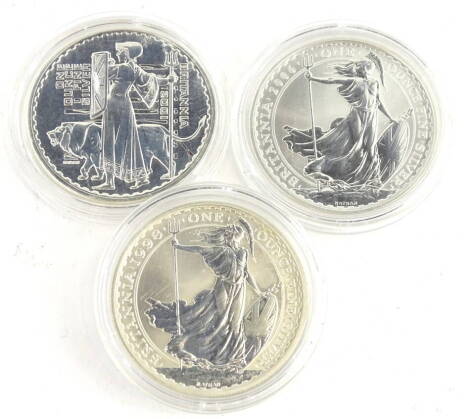 Three silver Britannia coins, comprising 1998, 2001 and 2006.