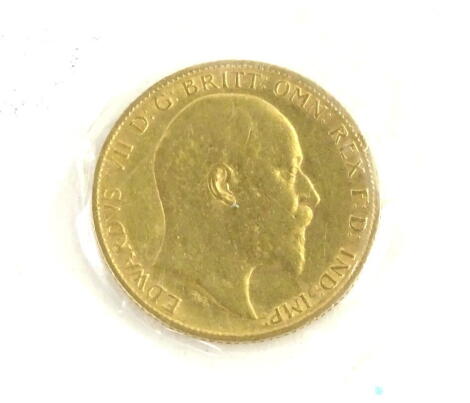 An Edward VII 1908 half gold sovereign.