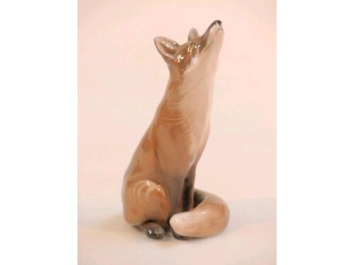 A Royal Copenhagen figure of a seated fox