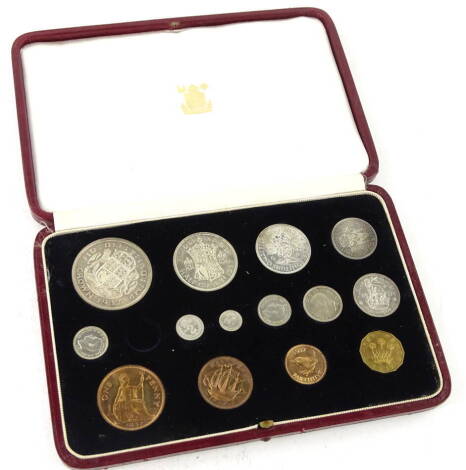 A near complete George VI 1937 specimen coin set, in red leather case.