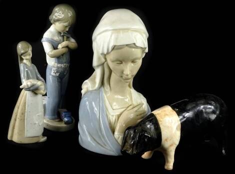 A collection of ceramics, to include a Lladro bust of the Madonna, two other Lladro figures and a pig shaped money box.