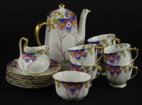 A New Chelsea woodland pattern Art Deco part tea service, each piece decorated with colourful flowers, leaves etc., printed marks to underside.