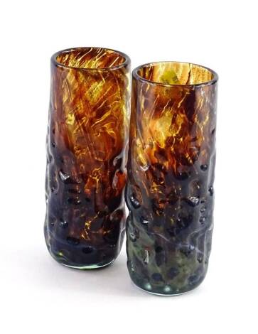 A pair of Mdina cylindrical vases, each in turquoise, brown, green etc., signed to underside, 20cm H.