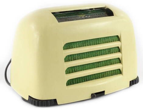 A KB cream and black Bakelite toaster, with green coloured mesh grill, 24cm W.