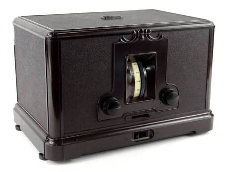 Ekco brown Bakelite radio with Edwardian style decoration, 32cm W.