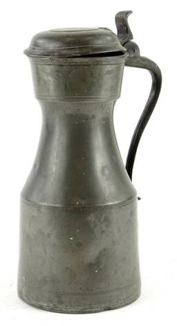 A Continental pewter lidded flagon, the domed lid engraved LG, possibly French, 28cm H.