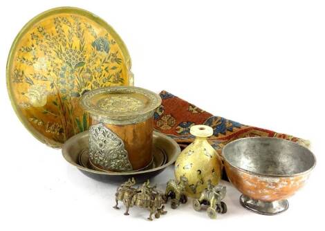 A collection of Middle Eastern items, to include a papier mache vase, a small mat, tray decorated with flowers and figures in gilt, a cylindrical vessel etc.