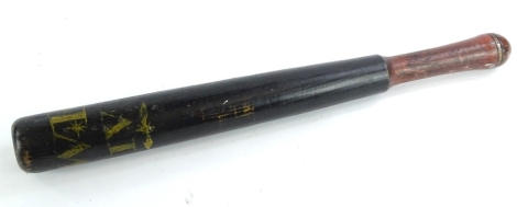 A William IV truncheon, painted in black with initials etc., with a brown painted handle, 39cm L.