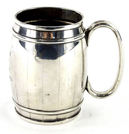 A George V silver barrel shaped Christening mug, engraved with initials and dated 1933, Sheffield 1929 by Atkin Brothers, 5¼oz, 8cm H.