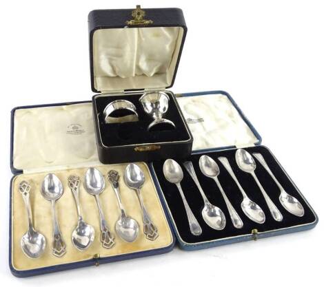 A collection of small silver, to include teaspoons in a fitted case, another set of teaspoons each with pierced handle, a Christening egg cup and napkin ring in a fitted case, 6oz overall. (3)