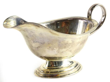 A George V plain silver sauce boat, with a domed foot, Birmingham 1930, 4¼oz.