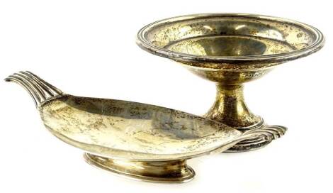 A George VI boat shaped dish, with readed tapering handles, Birmingham 1938, and a small stand, 5¾oz. (2)