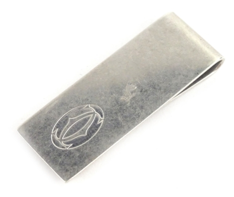 A Cartier silver money clip, bearing marks for Cartier Spain 925 C15 and maker JC, 5.2cm long, 16.8g.