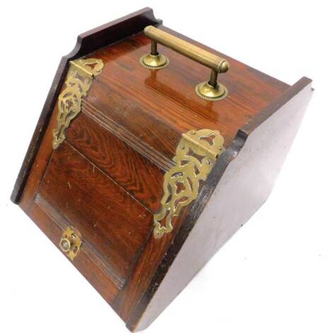 A Victorian stained pine and brass coal scuttle, with a hinged lid, 34cm W.